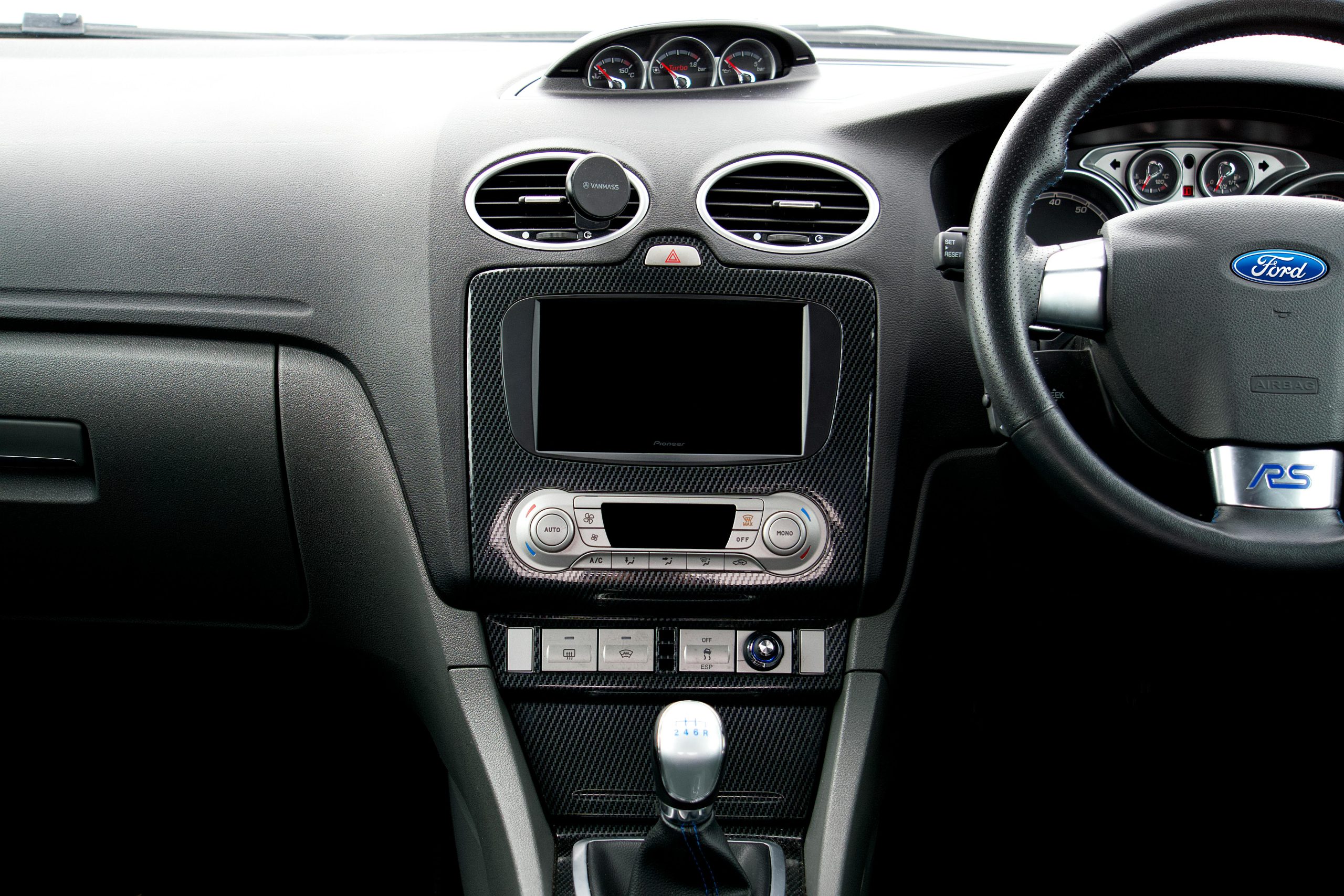 Black Dashboard and Steering Wheel of a Car